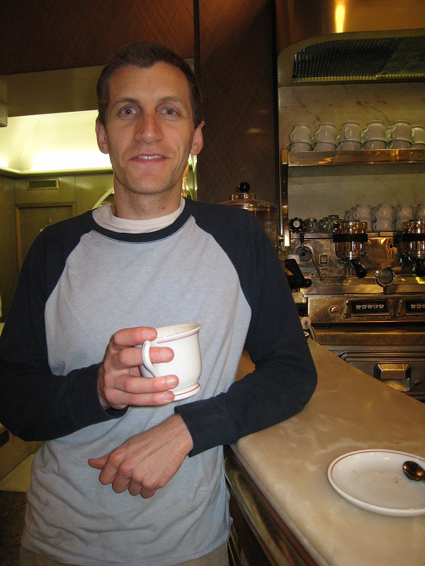 IMG_2112.JPG - Dan stands at the counter with this coffee drink, since many places charge an exorbitant fee to sit down.